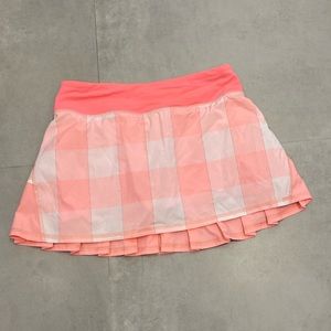 lululemon pace setter tennis skirt size 4, 12 inch length peach plaid pattern